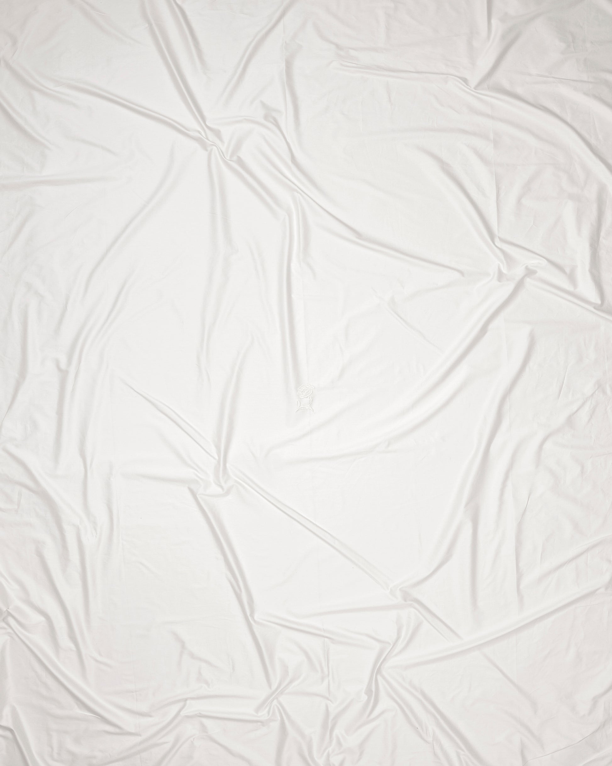 White fabric with a textured pattern