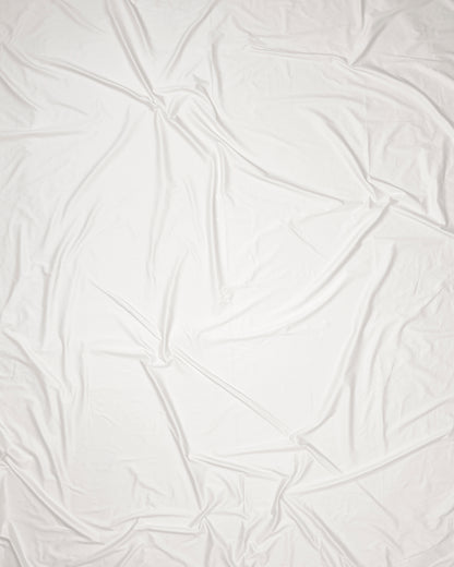 White fabric with a textured pattern